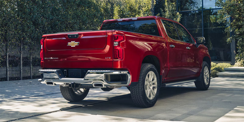 a red 2026 Chevrolet Silverado 1500 truck parked outside in Willard, OH
