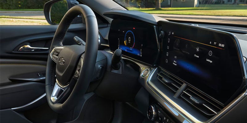 Chevrolet Equinox interior dashboard with digital instrument cluster and infotainment touchscreen display.
