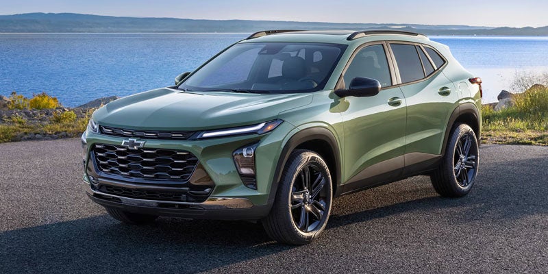 Chevrolet Equinox SUV parked near a scenic waterfront with modern exterior styling.